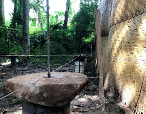 Balanced foundation footings with stone capping in place
