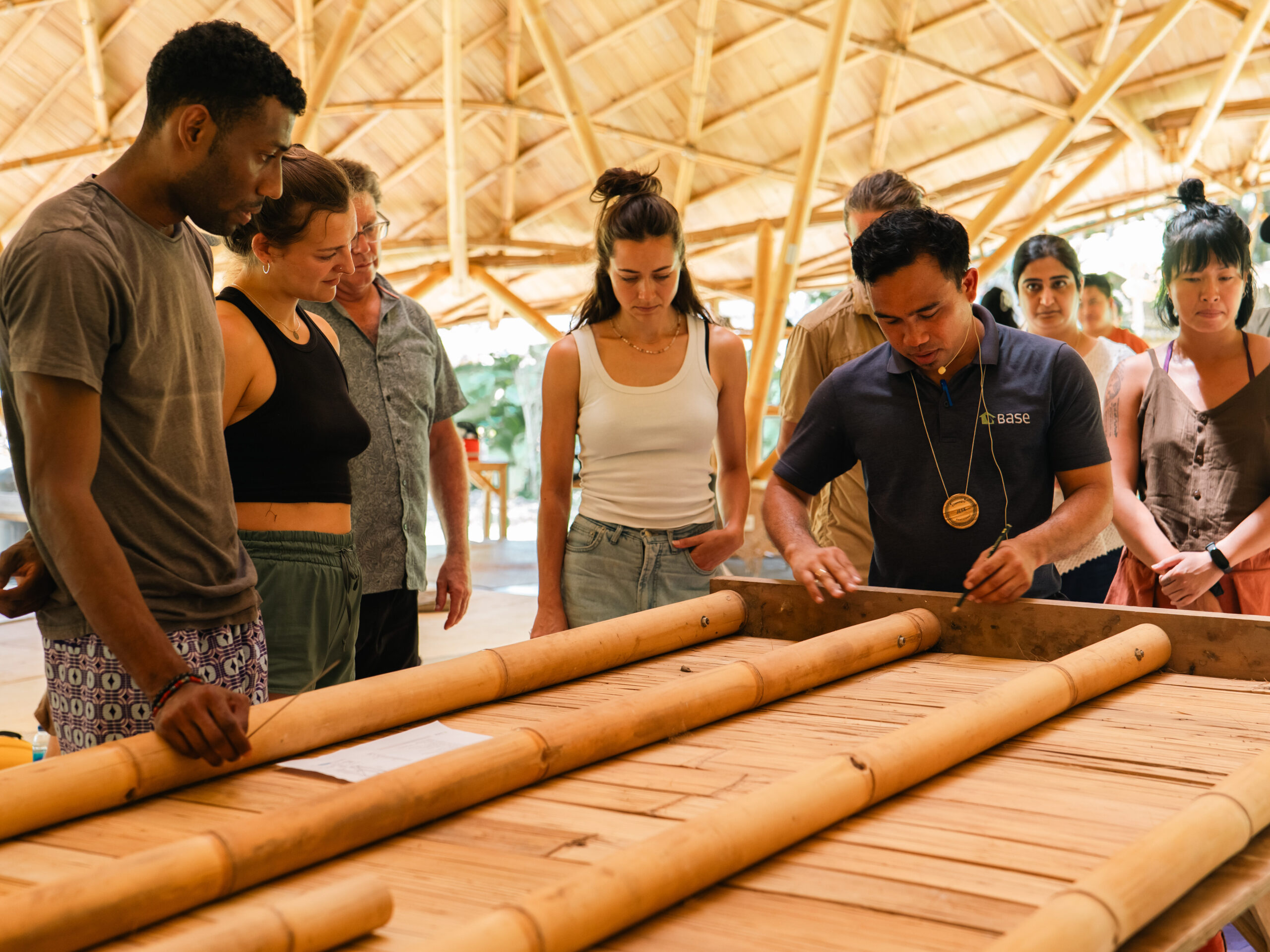 Jese Mar Gallarde of Base Bahay teaching CBFT bamboo panel making at Bamboo U
